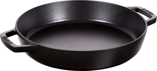 Staub Paella-Pfanne 34 cm aus Gusseisen, ideal für die Zubereitung von Paella.